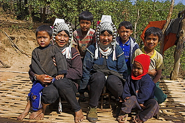 Nun Lin Kong village (Akha Tribe), Akha ladies and children, Kengtung (Kyaing Tong), Shan State, Myanmar (Burma), Asia