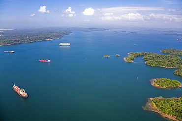 Container ships on Gatun Lake heading for Gatun Locks, Panama Canal, Panama, Central America