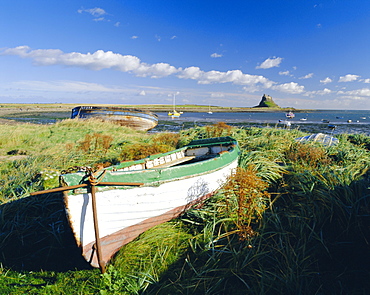 Looking towards Lindisfarne Castle (NT) from the harbour, Lindisfarne (Holy Island), Northumberland, England