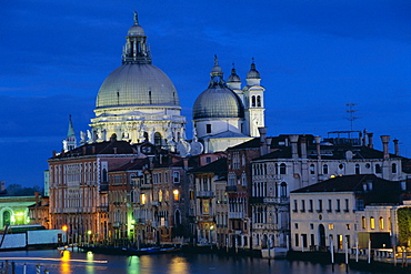 View along Grand Canal towards Santa Maria Della Salute church at night, Venice, UNESCO World Heritage Site, Veneto, Italy, Europe