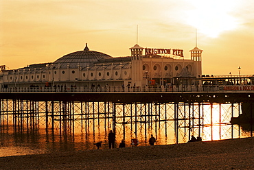 Brighton Pier at sunset, Brighton, East Sussex, England, United Kingdom, Europe