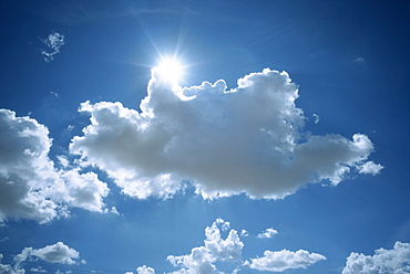 Sun emerging from behind cloud, near Mariental, Namibia, Africa