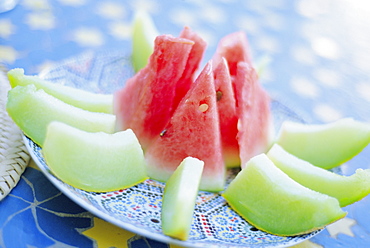 Slices of melon, commonly served as dessert in Moroccan restaurants, Marrakech, Morocco, North Africa