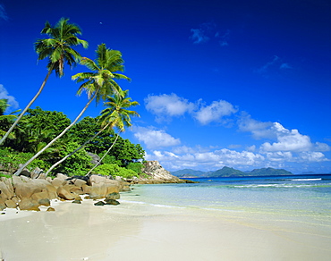 Anse Severe, La Digue, Praslin Island in background, Seychelles