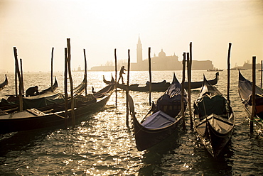 View towards San Giorgio Maggiore, and gondolas, Venice, Veneto, Italy, Europe