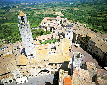 Looking down on San Gimignano from one of the town's medieval stone towers, San Gimignano, UNESCO World Heritage Site, Tuscany, Italy, Europe