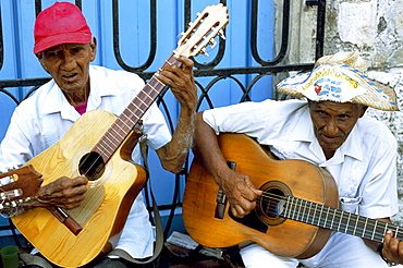 Musicians playing guitars, Havana Viejo, Havana, Cuba, West Indies, Central America