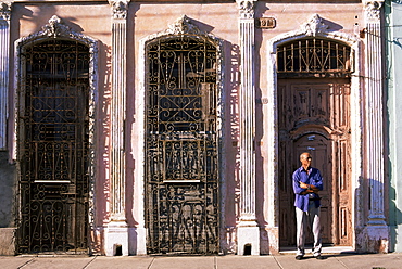 Building facades in evening light, Cienfuegos, Cuba, West Indies, Central America