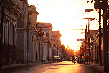 Street scene at sunrise, Cienfuegos, Cuba, West Indies, Central America