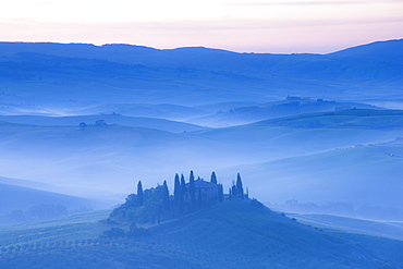 Misty dawn view towards Belvedere, across Val d'Orcia, UNESCO World Heritage Site, San Quirico d'Orcia, near Pienza, Tuscany, Italy, Europe