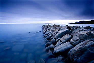 Stone jetty at twilight, Kimmeridge Bay, Purbeck District, Dorset, England, United Kingdom, Europe