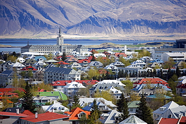 View over Reykjavik with mountains looming in the distance, Reykjavik, Iceland, Polar Regions