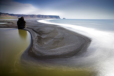 View from Dyrholaey towards the volcanic sand beach and rock stacks at Reynisdrangar, near the village of Vik i Myrdal, southern area, Iceland, Polar Regions