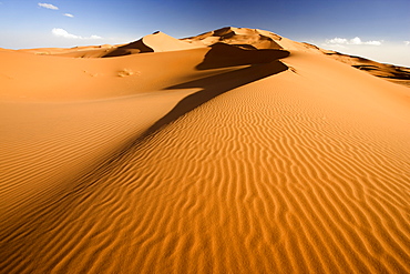 Rolling orange sand dunes and sand ripples in the Erg Chebbi sand sea near Merzouga, Morocco, North Africa, Africa