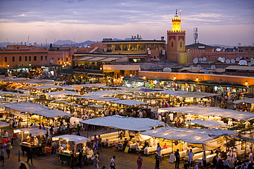 View over Djemaa el Fna at dusk with foodstalls that are set-up daily to serve tourists and locals, Marrakech, Morocco, North Africa, Africa