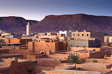 View over town of Nkob bathed in morning sunlight with modern minaret in the distance, Nkon, southern Morocco, Morocco, North Africa, Africa