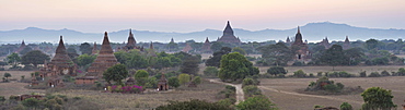 Panoramic view at dusk over the plain and temples of Bagan from Shwesandaw Paya, Bagan Central Plain, Myanmar (Burma)