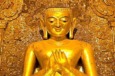 Golden Buddha image standing 33ft tall inside Ananda Paya, Bagan, Myanmar (Burma), Southeast Asia