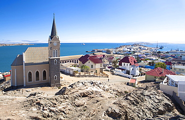 View of Felsenkirche (church) and the coastal town of Luderitz with its colourful Germanic architecture, Namibia, Africa