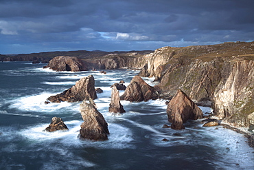 Rugged coastline being pounded by waves on the West coast of Lewis at Mangersta, Isle of Lewis, Outer Hebrides, Scotland, United Kingdom, Europe 