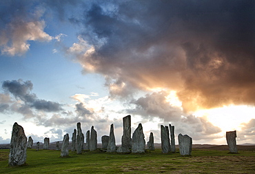 Standing Stones of Callanish at sunset with dramatic sky in the background, near Carloway, Isle of Lewis, Outer Hebrides, Scotland, United Kingdom, Europe 