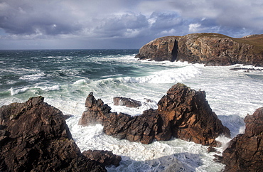 Heavy seas pounding the rocky coastline at Dalbeg, near Carloway, Isle of Lewis, Outer Hebrides, Scotland, United Kingdom, Europe 