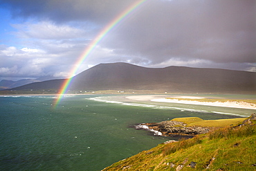 View across the beach at Seilebost towards Luskentyre and the hills of North Harris with a rainbow arching across the scene, Seilebost, Isle of Harris, Outer Hebrides, Scotland, United Kingdom, Europe 