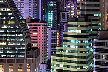 High rise buildings of Bangkok at night from Rembrandt Hotel and Towers, Sukhumvit 18, Bangkok, Thailand, Southeast Asia, Asia