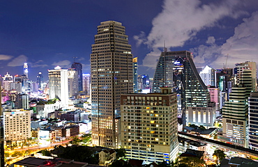 High rise buildings of Bangkok at night from Rembrandt Hotel and Towers, Sukhumvit 18, Bangkok, Thailand, Southeast Asia, Asia