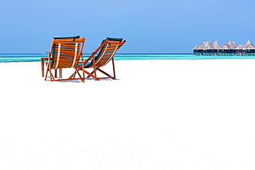 Wooden sun loungers on beach, Coco Palm, Dhuni Kolhu, Baa Atoll, Republic of Maldives, Indian Ocean, Asia