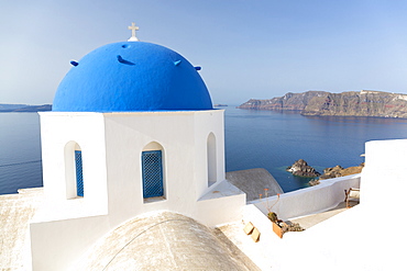 White church with blue dome overlooking the Caldera, Oia, Santorini, Cyclades, Greek Islands, Greece, Europe