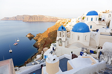 Classic view of the village of Oia with its blue domed churches and colourful houses, Oia, Santorini, Cyclades, Greek Islands, Greece, Europe