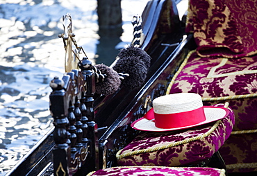 Detail of traditional Venetian Gondola showing Gondolier's straw hat, Venice, Veneto, Italy, Europe