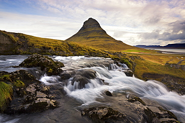 Mountain river with Kirkjufell (Church Mountain) in background, Grundafjordur, Snaefellsnes Peninsula, Iceland, Polar Regions