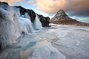 Kirkjufell (Church Mountain) in winter, with frozen waterfall, near Grundafjordur, Snaefellsnes Peninsula, Iceland, Polar Regions