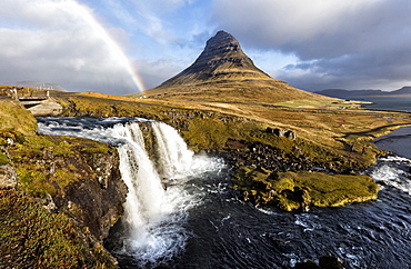 View of Kirkjufell (Church Mountain), mountain stream and rainbow, Grundafjordur, Snaefellsnes Peninsula, Iceland, Polar Regions