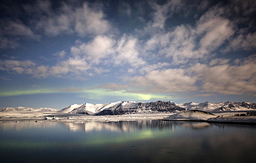 Weak winter Aurora Borealis (Northern Lights) over Jokulsarlon Glacial Lagoon, South Iceland, Polar Regions