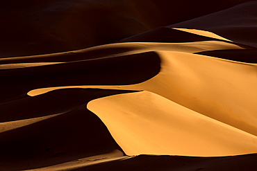 Shapes and shadows in dunes of the Erg Chebbi sand sea, part of the Sahara Desert near Merzouga, Morocco, North Africa, Africa