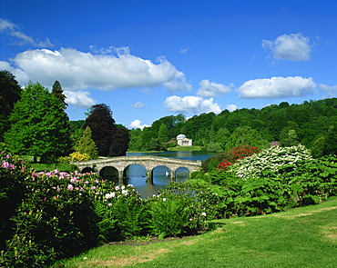 Bridge over lake at Stourhead Gardens, Wiltshire, England, United Kingdom, Europe