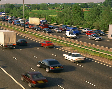 Lorries, vans and cars in a traffic jam on a motorway, United Kingdom, Europe