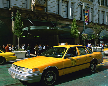 Yellow cabs outside Macy's Department Store in New York, United States of America, North America