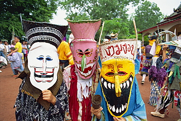 Portrait of people wearing masks of ghosts in the temple at the festival of Loei Peetakhon, Thailand, Southeast Asia, Asia