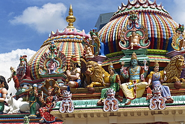 Close-up of statues and domes on the roof of the Sri Mariamman Temple, a Hindu temple in Singapore, Southeast Asia, Asia