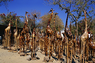 Giraffe carvings for sale, Victoria Falls town, Zimbabwe, Africa