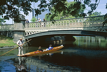 Punt on River Avon going under bridge, Christchurch, Canterbury, South Island, New Zealand, Pacific