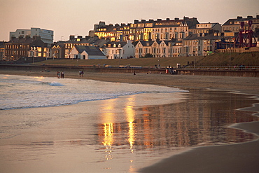 Dusk light on the beach at Portrush, County Antrim, Ulster, Northern Ireland, United Kingdom, Europe