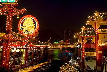 Aberdeen floating restaurant harbour at dusk, Hong Kong, China, Asia