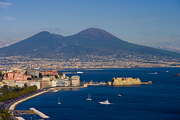 Cityscape including Castel dell Ovo and Mount Vesuvius, Naples, Campania, Italy, Europe