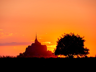 Mont St. Michel, UNESCO World Heritage Site, holy island and peninsula at sunset, Normandy, France, Europe