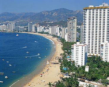 The beach and high rise buildings at the resort of Acapulco, Mexico, North America